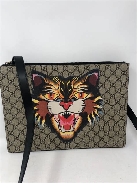 gucci trainers tiger|Gucci tiger clutch.